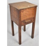 An Edwardian Oak Lift Top Sewing Box on Stand, 33cm wide
