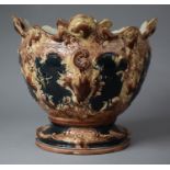 A Majolica Glazed Jardiniere with Wavy Rim and Relief Decoration, Hairline Crack and Some Chips to
