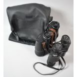 Two Pairs of Binoculars and a Canvas Carrying Bag