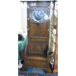 An Edwardian Oak Hall Stand with Circular Mirror Above Small Shelf, 6 Brass Coat Hangers, Central