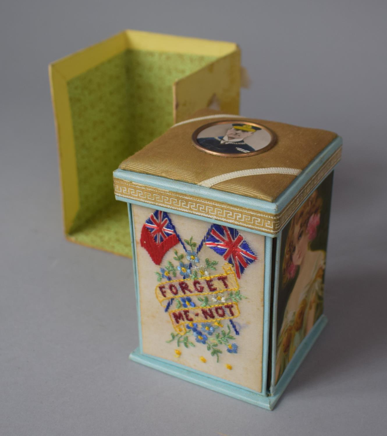 A WWI Forget Me Not Cardboard Sewing Box with Fold Down Sides Containing Needles, Central Thimble