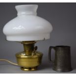 A Pewter Tankard and a Brass Aladdin Lamp