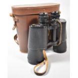 A Leather Cased Pair of Binoculars