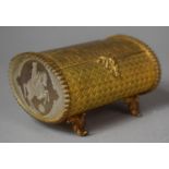 A French Gilt Metal Oval Box with Hinged Lid Decorated in Relief and Acid Etched Oval Glass End