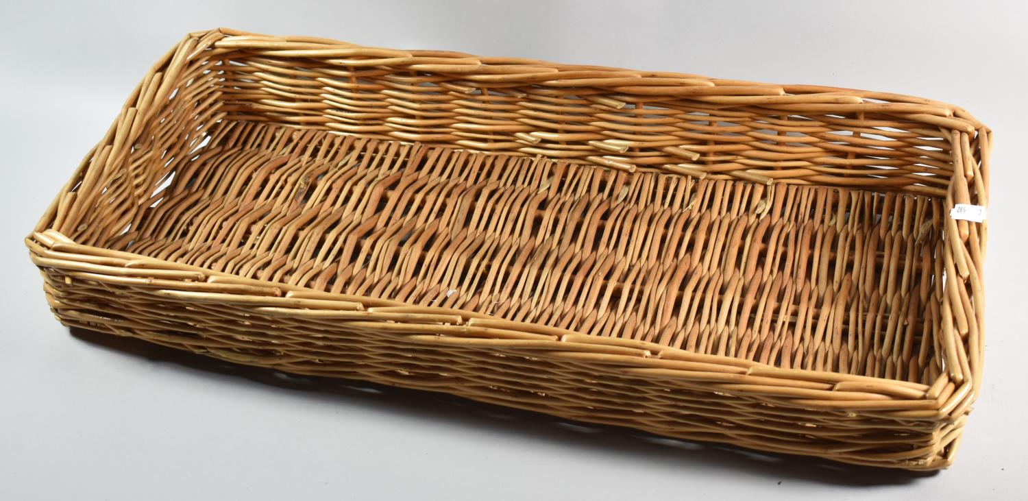 A Wicker Tray, 66cm high