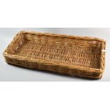 A Wicker Tray, 66cm high