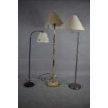 An Onyx and Brass Standard Lamp, Adjustable Reading Lamp and Stainless Steel Standard Lamp