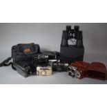 A Collection of Various Vintage Cameras, Binoculars, Clockwork Cine Camera etc