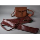 A Leather Cartridge Bag, Leather Shot Gun Bag and Two Vintage Shooting Sticks