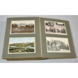 An Early 20th Century Postcard Album Containing Mixed, Coloured and Monochromed Postcards, WWI Silk,