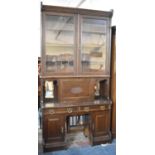 An Arts and Crafts influenced Oak Bureau Bookcase with Two Centre Drawers, 122cm Wide