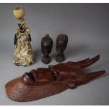 Two Carved Hard Wood African Busts, a Carved African Souvenir Tribal Mask and a Figure