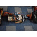 A Hot Air Paint Stripper, Homelite Petrol Chain Saw, Electric Strimmer and Belt Sander