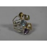 A Silver and Semi Precious Stone Five Section Ladies Ring by TGGC