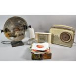A Box Containing Vintage Electric Heater, Bush Radio, 45rpm Records, Clocks etc