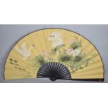 A Large Modern Oriental Fan Decorated with Swans in Reeds, 76cm long