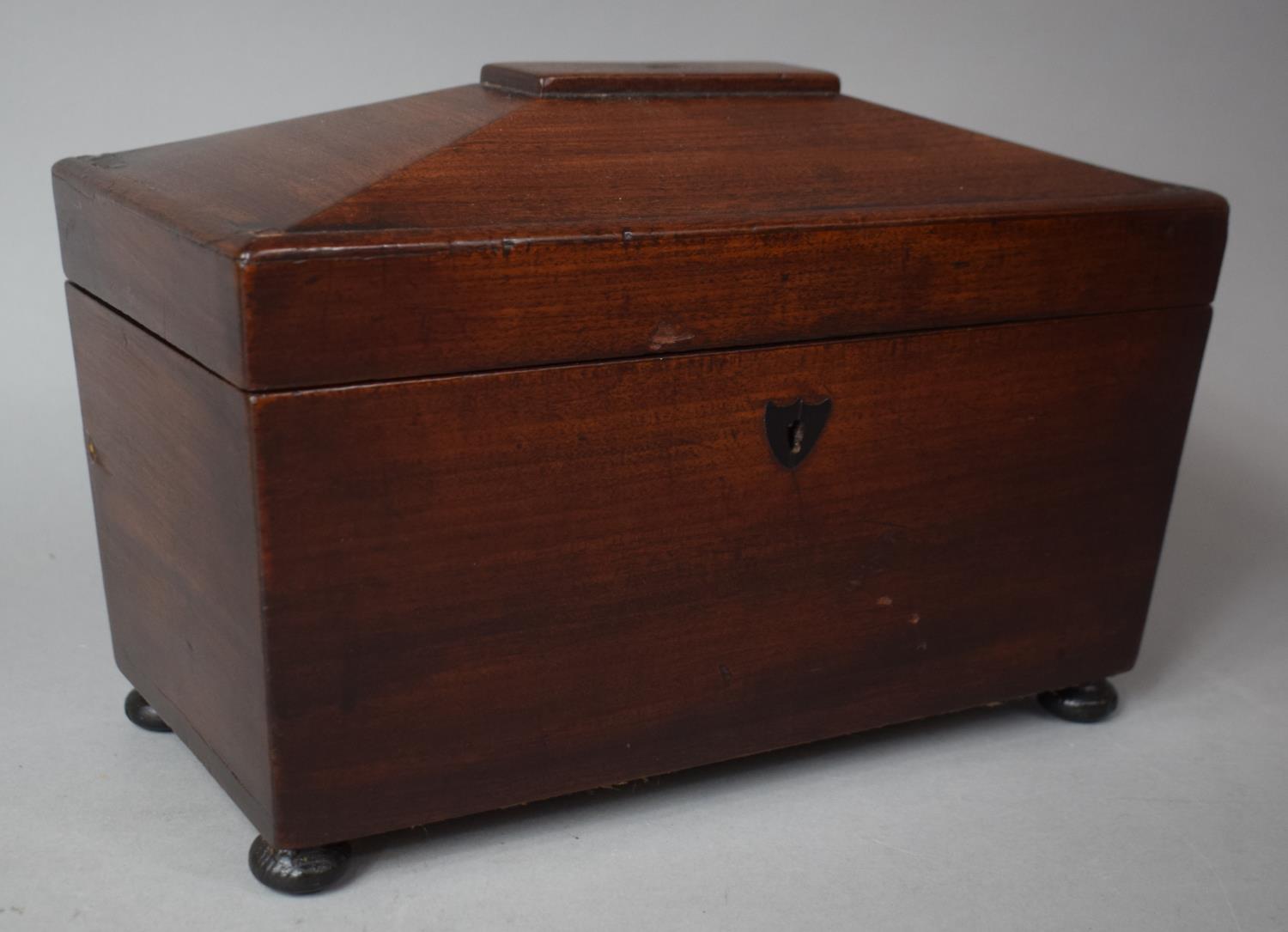 A Mid 19th Century Mahogany Sarcophagus Shaped Two Division Tea Caddy with Replacement Cut Glass