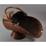 A 19th Century Copper Coal Scuttle, 33cms High