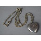 A Sterling Silver Love Heart Shaped Locket on Silver Chain