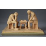 A Model of Gents playing Chess, Inscribed Eskedd 1997, 23cms Wide