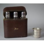 A Novelty "Just A Thimble Full" Spirit Measure together with an Italian Leather Cased Set of Three