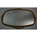 A Gilt Framed Wall Mirror with Pierced Scrolled Decoration, 70cms Wide