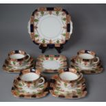 An Edwardian Pattern Part Tea Service Comprising Four Cups, Four Saucers, Six Side Plates and a Cake