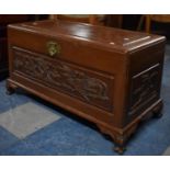 An Oriental Camphor Wood Hinged Chest with Carved Front Panel