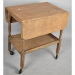 A Mid/Late 20th Century Drop Leaf Trolley with Stretcher Shelf, 55cms Wide