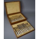 A Oak Cased Canteen of Silver Plated Mother of Pearl Handled Fruit Knives and Forks by Mappin and
