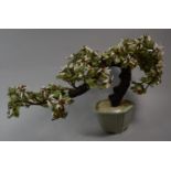 An Oriental Prunus Blossom Parted Glass Tree in Celadon Planter, 30cms High