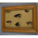 A Framed Collection of Six Various Salmon Fishing Flies, 13x18cms