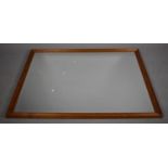 A Large Framed Bevel Edged Wall Mirror, 100x131.5cms High