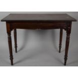 A 19th Century Stained Pine Side Table, with Turned Tapering Legs, 99x57.5x43cms High
