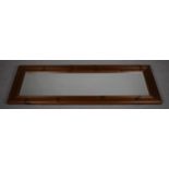 A Wooden Framed Rectangular Dressing Mirror with Bevelled Glass, 46cms Wide by 138cms High