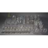 A Collection of Various Drinking Glasses to Include Five Etched Champagne Coupes, Finger Bowls,