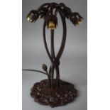 A Reproduction Art Nouveau Bronze Effect Five Branch Table Lamp in the Form of Lilies (No Shades)