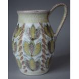 A Denby Glyn Colledge Jug, 21cms High