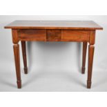 A Mahogany Rectangular Side Table with Crossbanded Top and Two Drawers on Square Tapering Legs