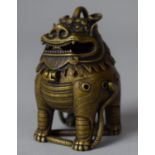 A Chinese Bronze Incense Burner in the Form of a Temple Lion Standing on Snake with Hinged Lid,
