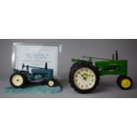 A Novelty Desk Top Clock in the Form of a John Deere Tractor Together with John Deere Photo Frame