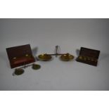 A 19th Century Mahogany Set of Pan Scales, Part Bakelite Cased Set of Metric Weights and a Larger