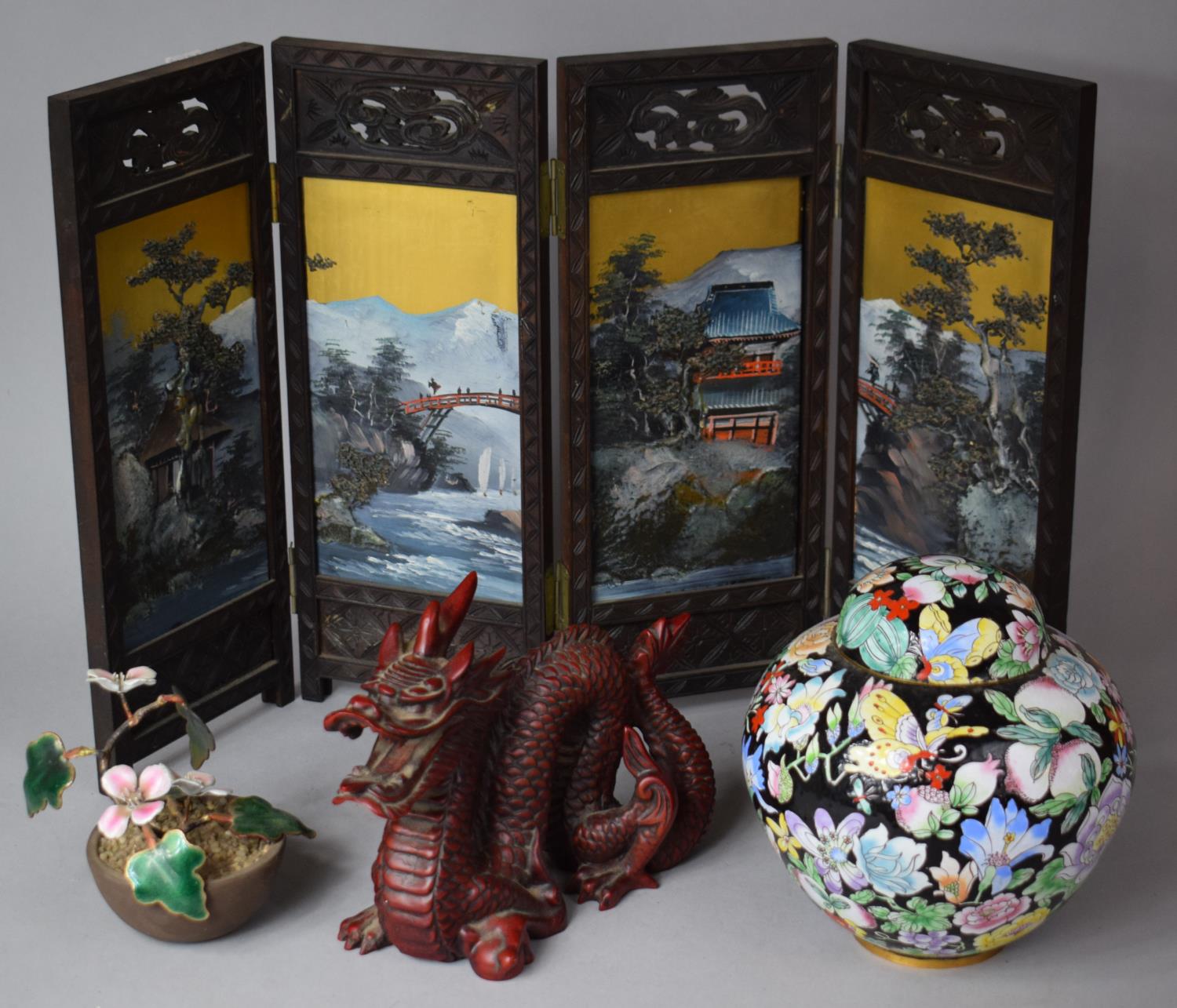 An Oriental Lacquer Work Four Fold Table Screen, Resin Dragon Ornament, Enamelled Ginger Jar and