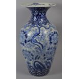 A 19th Century Chinese Blue and White Vase Decorated with Flowers and Trees, 46cm high
