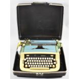 A Vintage Imperial Portable Manual Typewriter in Briefcase