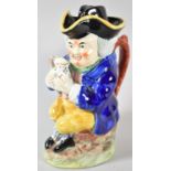 A 19th Century Staffordshire Toby Jug with Tricorn Hat Lid, Holding a Jug of Ale, 20cm high