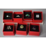 A Collection of Six Silver Rings, Five with Stone Mounts to Include Amethyst, Malachite, CZ, Peridot