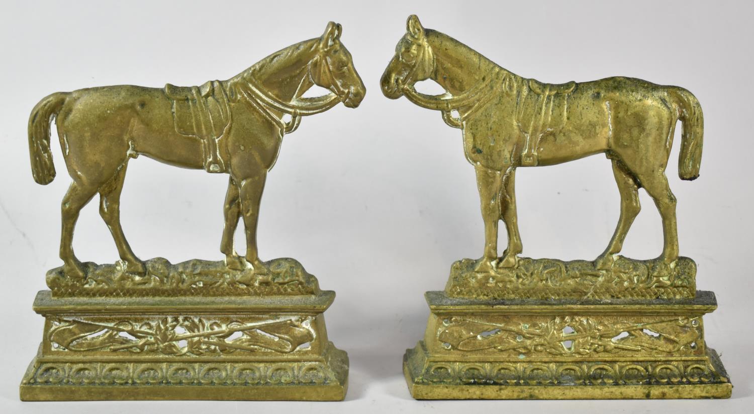 A Pair of Late 19th Century Brass Fireside Ornaments in the Form of War Horses, 19.5cm Wide