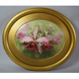 A Gilt Framed Oval Porcelain Plaque Depicting Flowers, 25cm wide