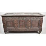 A 19th Century Inlaid Coffer Chest with Carved Top Rail Having Unrelated Four Panel Hinged Lid,